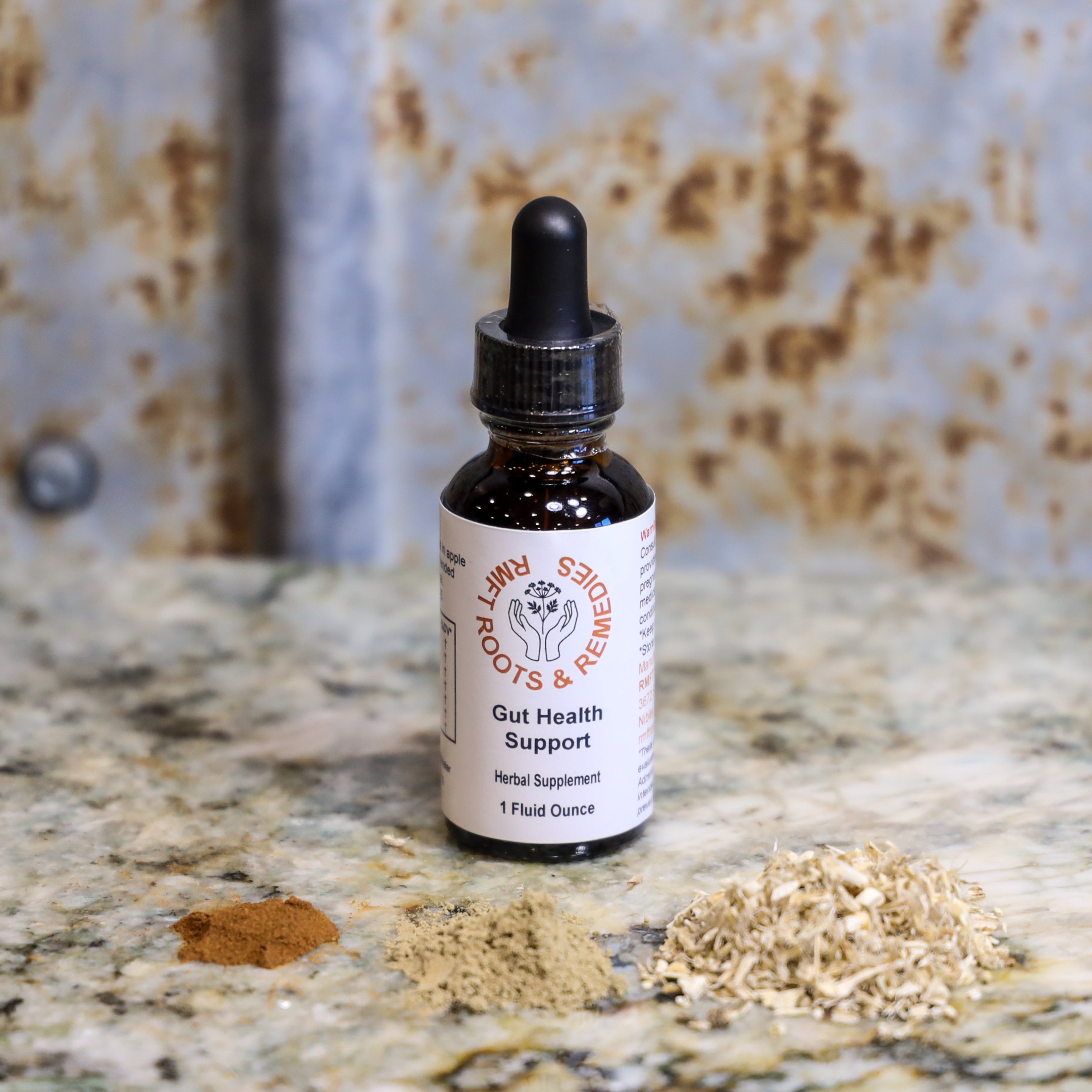 Bottle of 'Gut Health Support' supplement on a textured surface.